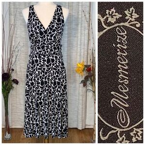 Mesmerize black and white abstract spotted sleeveless A-line dress.